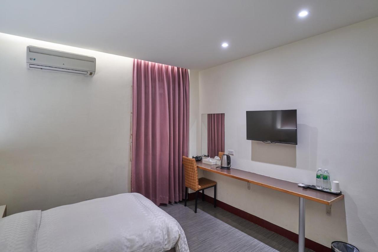 Yung An Business Hotel Dounan Exterior photo